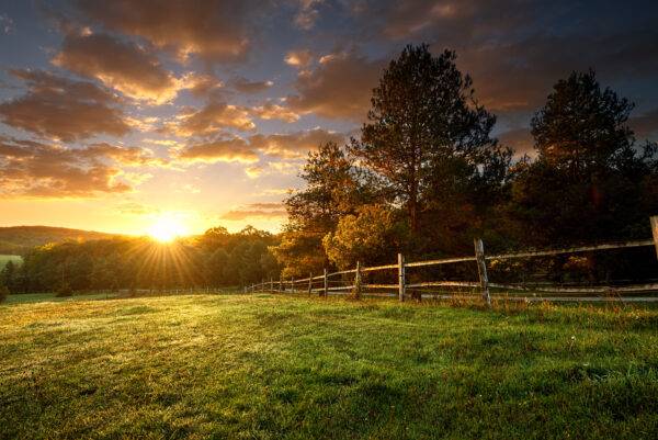 Picturesque landscape, fenced ranch at sunrise “Luxury Mountain Living in the Heart of the Smokies”